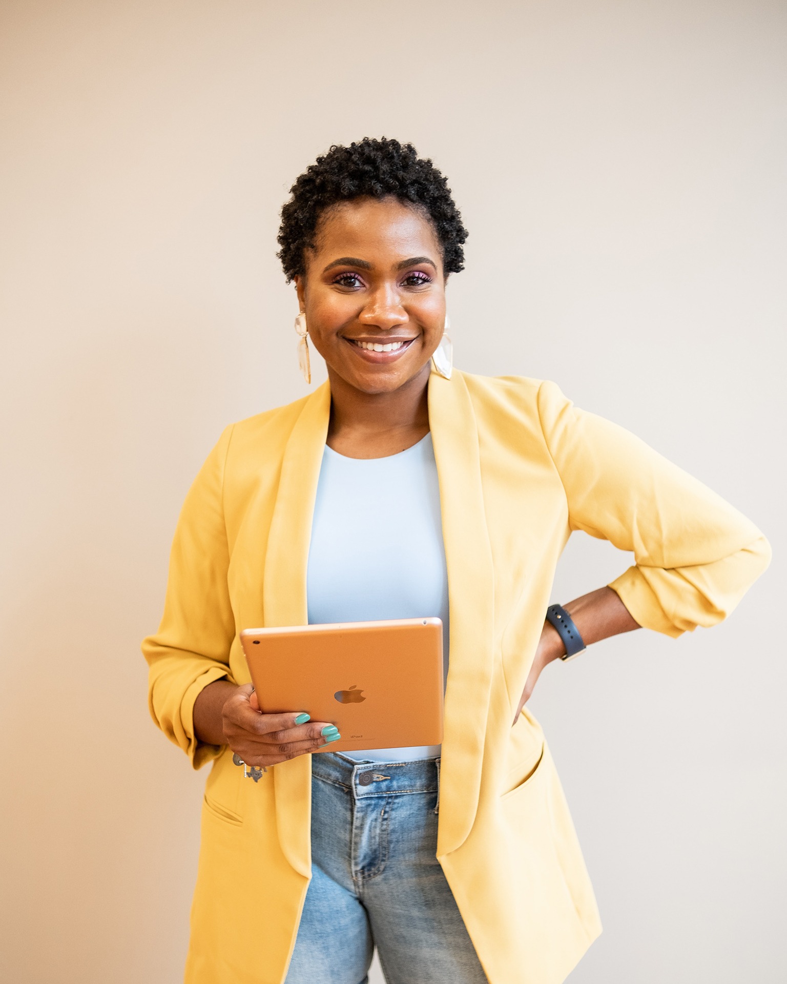 black woman yellow cardigan ipad
